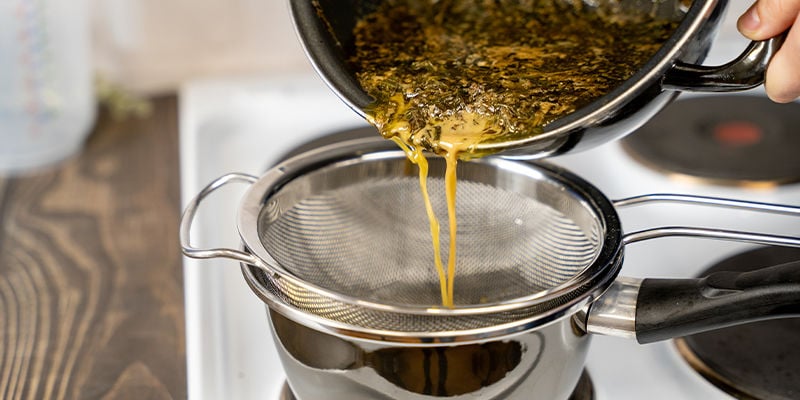 After this time, take the liquid off the heat, then pour it into a heat-resistant container using a sieve or cheesecloth.