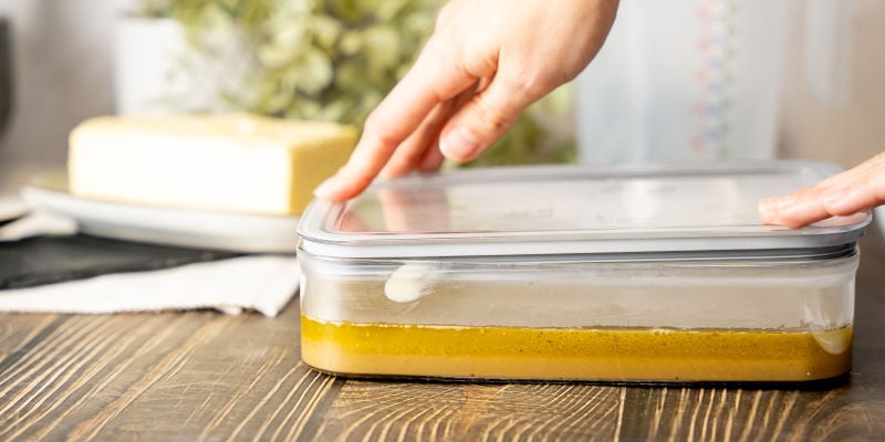 You are now left with a container that has a layer of oil on top of a layer of water.