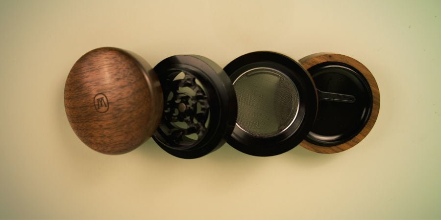 Which Features Are Often Found on Wooden Grinders?