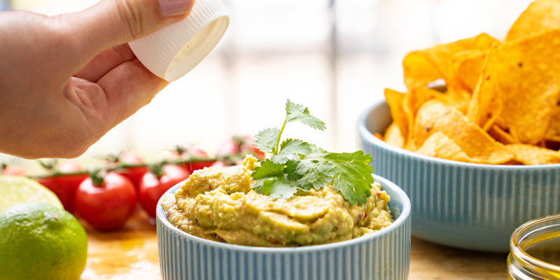 Scoop Out Your Guac Into A Serving Bowl