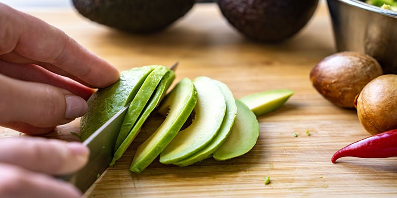 Begin By Removing The Skin And Seeds From The Avocados, And Cut Them Into Slices