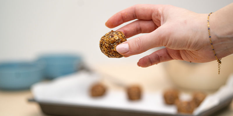 Instructions: Using your hands, mould the resulting mix into 24 evenly sized balls