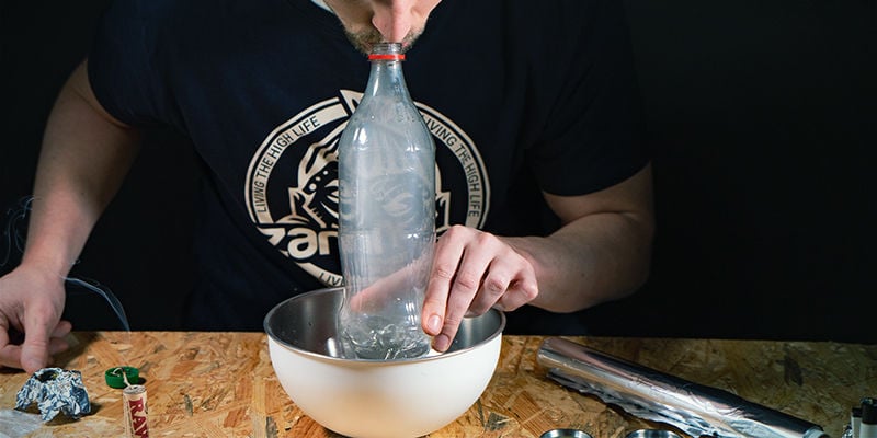 Waterfall gravity bong: Put your mouth over the top and breathe in hard.