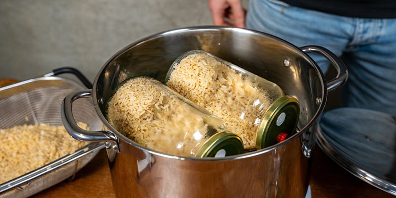 Place the jars atop a steel rack inside a pressure cooker