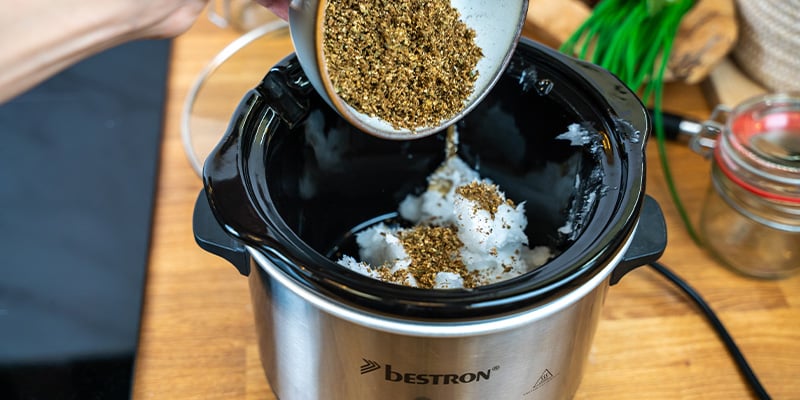 Step 2: Combine cannabis with coconut oil Step 2: Combine cannabis with coconut oil