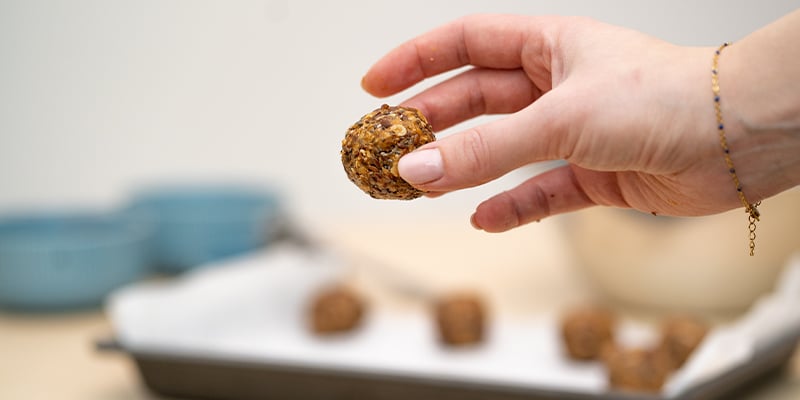 Instructions: Using your hands, mould the resulting mix into 24 evenly sized balls